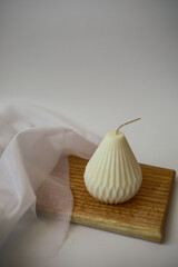  wax candle on wood stand