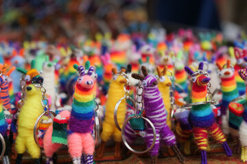 Close up of colorful woolen lama keyrings sold at the Otavalo market, Ecuador © Fearless on 4 Wheels