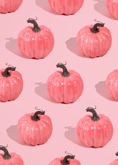 Creative pattern of pink pumpkins on pink background. Halloween concept