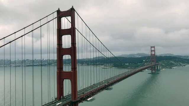 Classic view of the Golden Gate Bridge on an overcast day with San Francisco in the background - California, USA