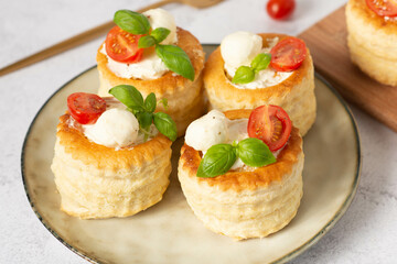 puffs with mozzarella and tomatoes