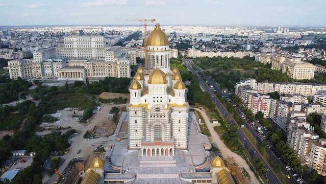 4K Drone flyover footage of the under construction Catedrala Mantuirii Neamului in Bucharest. People's Salvation Cathedral - the tallest and largest Eastern Orthodox church building.
