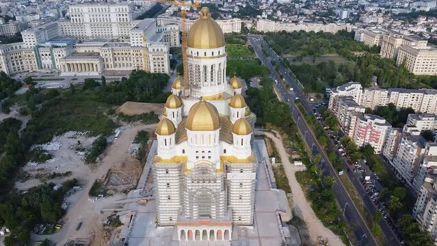 4K Drone flyover footage of the under construction Catedrala Mantuirii Neamului in Bucharest. People's Salvation Cathedral - the tallest and largest Eastern Orthodox church building.
