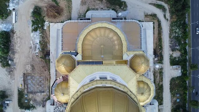 4K Drone flyover footage of the under construction Catedrala Mantuirii Neamului in Bucharest. People's Salvation Cathedral - the tallest and largest Eastern Orthodox church building.