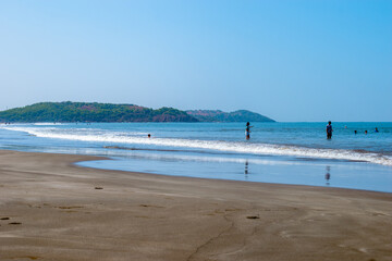 Unidentified people enjoying on the beach at Goa, India