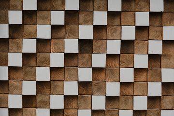 Texture of wooden cubes in natural color and painted white.