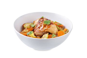Moroccan spiced chicken with zucchini and carrots in a plate on a white isolated background