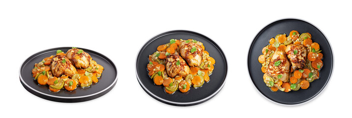 Moroccan spiced chicken with zucchini and carrots in a plate on a white isolated background