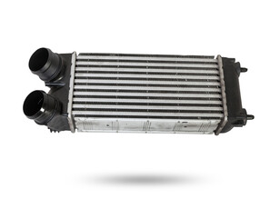 Car intercooler radiator for turbine cooling isolated on white background. Spare cooling system for...