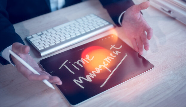 time management concept, businessman using digital tablet presenting message time management, business strategy marketing working development