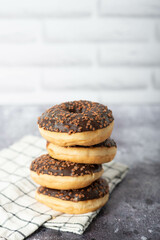 Donuts with colorful sprinkles isolated on white background. Top view.