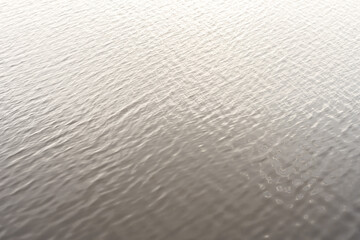 lake gray water smooth surface simple nature background
