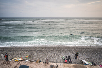 Lima, Peru - June 1, 2022. View of the surfers waiting the waves of the Pacific ocean - 628602920
