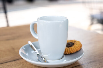 White cup of coffee and a biscuit, Willebroek, Antwerp, Belgium