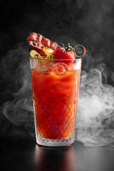 alcoholic cocktail with tomato juice and smoked meats