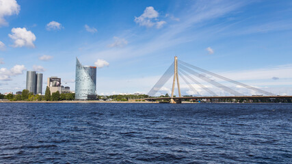Fototapeta na wymiar Vanšu bridge over Düna river connecting city districts of Riga in Latvia