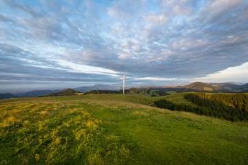 Mountain summer landscape with a wind mill in Styria, Austria