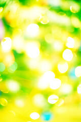 Obraz premium Abstract bokeh background of colorful glowing lights in soft focus