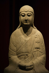 Fototapeta na wymiar Buddha stone sculpture in forbidden palace