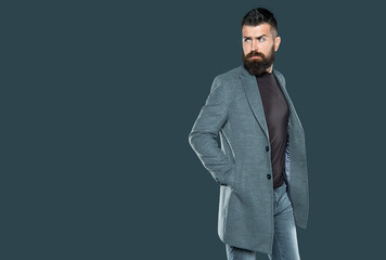 bearded mature guy wear casual on grey background