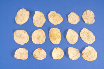 Some chips on a colored surface