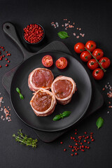 Delicious raw fresh pork or chicken meat rolls wrapped in bacon