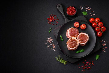 Delicious raw fresh pork or chicken meat rolls wrapped in bacon