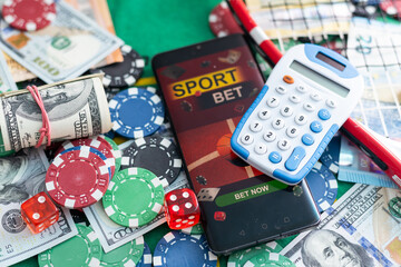 Online poker concept. Smartphone and poker chips on a green background. Poker online banner. Copy space. Vignette. Place for text. Gambling. Background