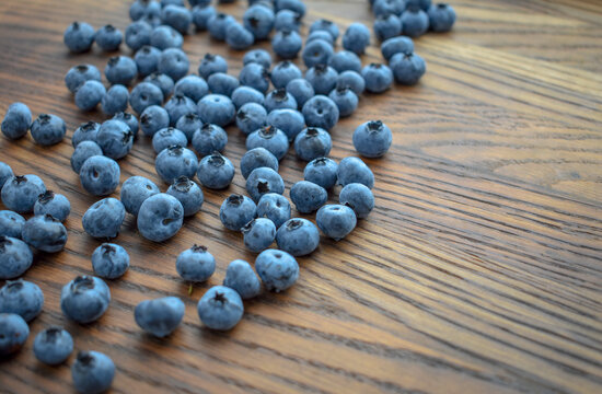Beautiful blueberry on a wooden background. Quality image for your project