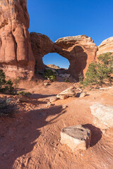 hiking the broken arch trail in arches national park, utah, usa