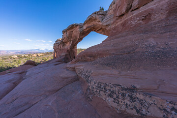 hiking the broken arch trail in arches national park, utah, usa