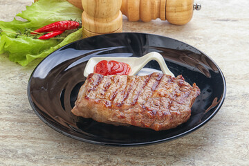 Grilled rib-eye steak beef meat