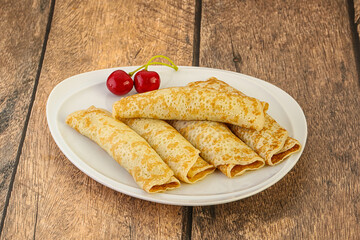 Sweet and tasty pancake with cherry