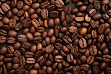 Obraz premium Fresh roasted coffee beans closeup pattern on dark background. Food pattern. Love coffee concept. Top view, flat lay with copy space