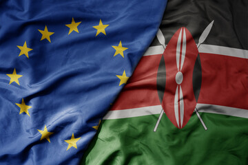 big waving realistic national colorful flag of european union and national flag of kenya .