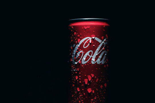 The Coca Cola drink on a black background, details, macro photography.
07.28.2023
