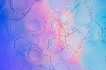 Iridescent colorful abstract background with bubbles, fluid texture pastel tones curvy wavy good vibes