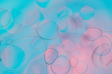 Iridescent colorful abstract background with bubbles, fluid texture pastel tones curvy wavy good vibes