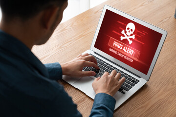 Virus warning alert on computer screen detected modish cyber threat , hacker, computer virus and malware