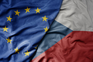 big waving realistic national colorful flag of european union and national flag of czech republic .