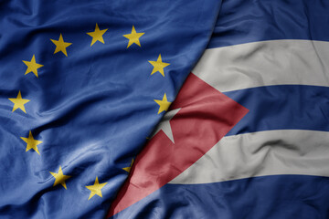 big waving realistic national colorful flag of european union and national flag of cuba .