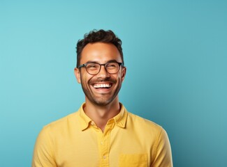 Obraz premium Beautiful man against blue background