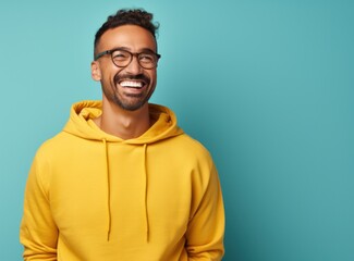 Fototapeta premium Beautiful man against blue background