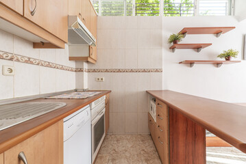 Open kitchen furnished in a loft apartment