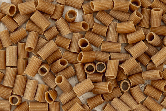 Tubes of cut whole wheat pasta