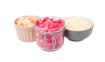 Delicious sauerkraut prepared according to different recipes on white background