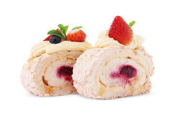 Slices of tasty meringue roll with jam, berries and mint leaves isolated on white