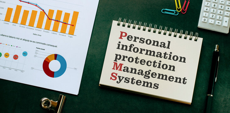 There is notebook with the word Personal information protection management systems. It is as an eye-catching image.