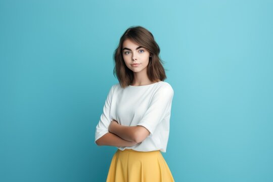 Portrait of a smiling fictional young elegant and stylish woman model. Isolated on a plain colored background. Generative AI.