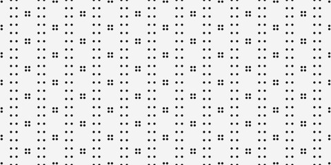 White background with black dots. Grid of four dots and vertical lines of dots. Design for textile, fabric, clothing, curtain, rug, batik, ornament, background, wrapping.